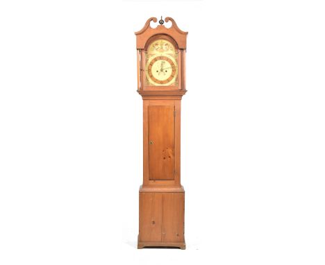 A 18th/19th Century stained pine longcase clockWith a broken swan neck pediment above a break arch twelve inch painted dial w