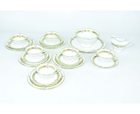 A Shelley six piece tea service early 20th CenturySet decorated with gilding and flowers, six cups, six saucers, five side pl