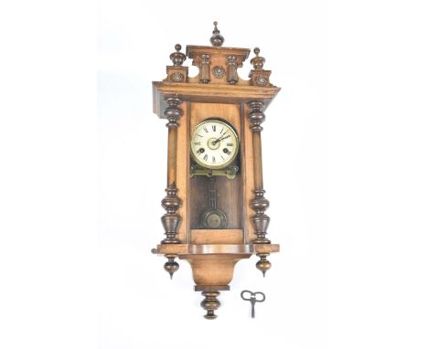 A Vienna wall clock of small proportions, late 19th CenturyGlazed case to reveal a cream 11cm dial with Roman numerals, R=A p
