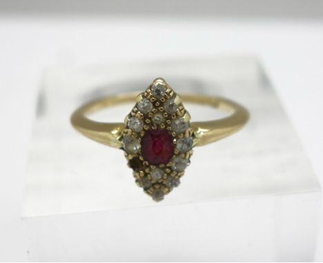 An 18ct gold, red stone and diamond ring, weight 2.4g, size K