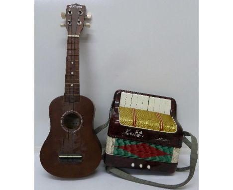 A Stagg ukelele and a Hero accordion 