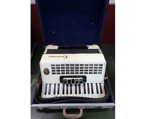 A Contasina accordion, cased