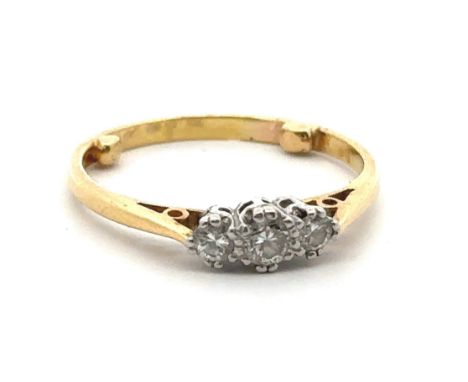 A three stone diamond ring, hallmarked 18ct, sponsor mark M&amp;M. Size approx O with sizing beads. Weight 2.91g. Estimated d