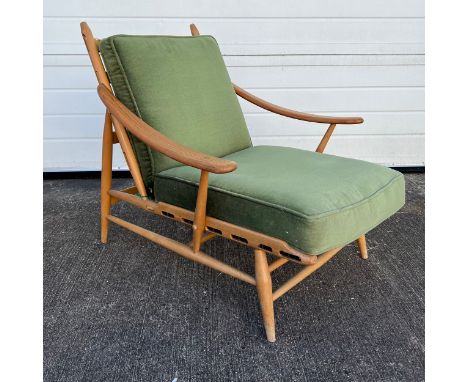 Lucian Ercolani (Italian, 1888-1976) for Ercol Model 442 blonde elm and beech easy armchair with green upholstery. Height 78c