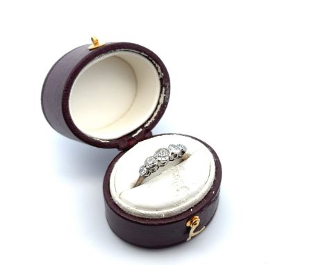 A five stone old cut diamond ring, stamped 18ct. Size . Estimated diamond weight Weight 1.77g.
