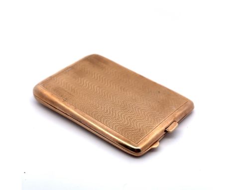 A 9ct gold matchbook holder with engine turned decoration. Hallmarks to interior for SJR, Edinburgh 1903. 6.5 x 4.5cm