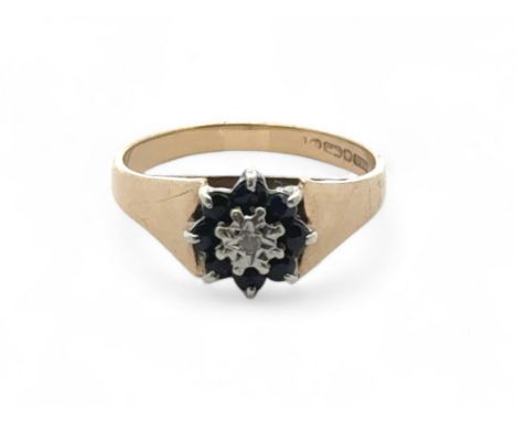 A Sapphire and diamond cluster ring, size O. Weight 3.13g
