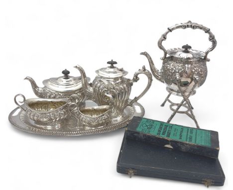 A collection of silver plated items including a four piece tea service by J&amp;C Co Ltd, a tea kettle with stand and some si