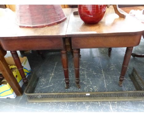 A GEORGE III MAHOGANY DINING TABLE WITH APRONS TO THE ROUNDED RECTANGULAR ENDS ON RING TURNED CYLINDRICAL LEGS AND BROWN CERA