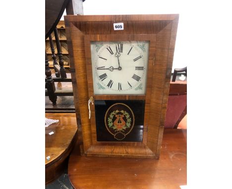 AN AMERICAN OGEE STYLE WALL CLOCK. 