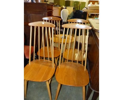 A SET OF ERCOL STYLE STICK CHAIRS. 