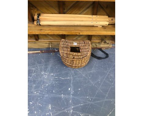 VINTAGE FISHING RODS , A REEL AND AN ARTISTS EASEL. 