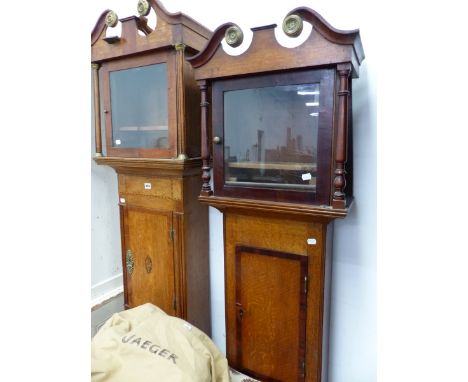 TWO MAHOGANY CROSS BANDED OAK LONG CASE CLOCK CASES, BOTH WITH SWAN NECK PEDIMENTS MOUNTED WITH BRASS ROUNDELS