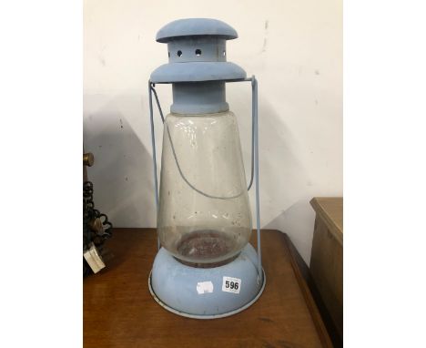 A RETRO BLUE PAINTED HURRICANE CARRY LAMP, AND A WALL CLOCK CALENDAR. 
