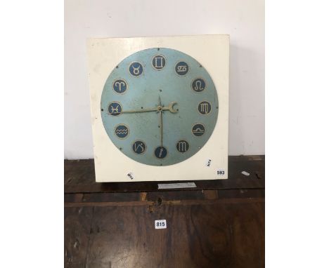 A ZODIAC SIGN MOUNTED CLOCK FACE. 