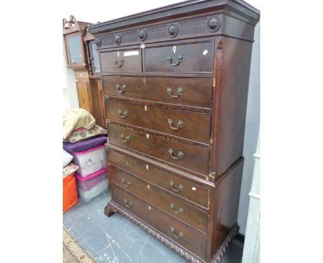 A 19th C. MAHOGANY CHEST ON CHEST, THE FLUTED CORNICE INTERSPACED WITH FIVE ROSETTES, THE CONFIGURATION OF EIGHT DRAWERS ABOV