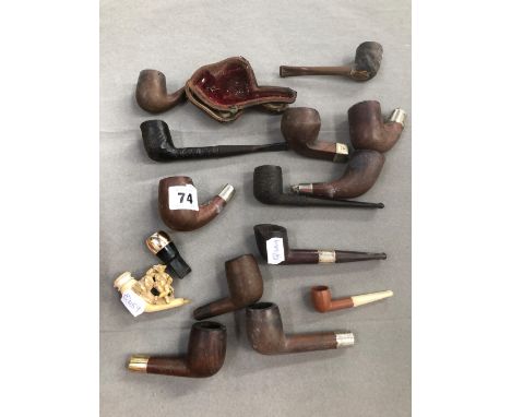 A CARVED MEERSCHAUM PIPE IN CASE AND VARIOUS BRIAR PIPE BOWLS.