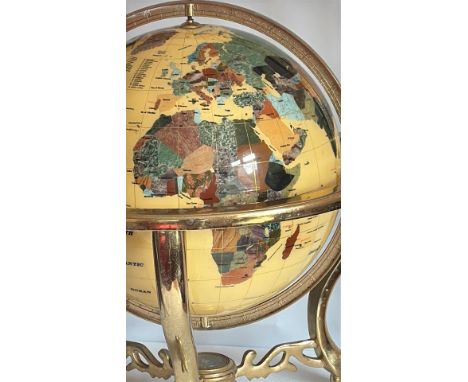 Vintage world globe, detailed map of Europe, metal axis mount, from the mid-20th century.