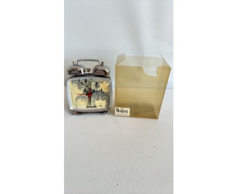 The Beatles 'Revolver' alarm clock, chrome with graphic dial, original packaging.