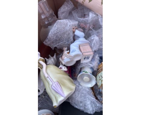 Mixed lot of porcelain and ceramic items including a floral rolling pin, figurines, and a decorative mug with gold and blue p
