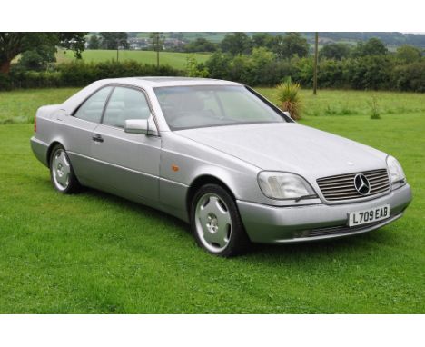 A 1994 Mercedes-Benz 600 SEC, registration number L709 EAB, silver. This flagship Mercedes coupé was supplied by Monarch Cars