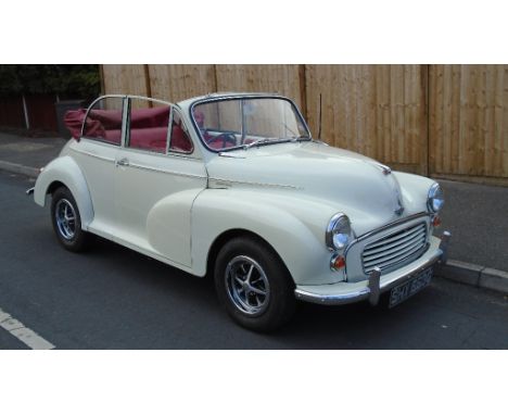 A 1969 Morris Minor replica convertible, registration number GFX 406D, Snowberry white. This innocent looking Morris Minor ha