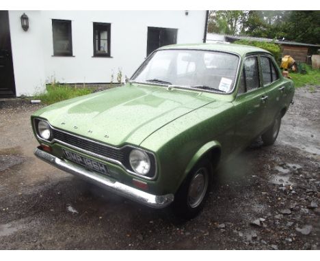 A 1969 Ford Escort Mk I four door saloon, registration DMP 186H, chassis number BB44JR04523, metallic green. This four door E