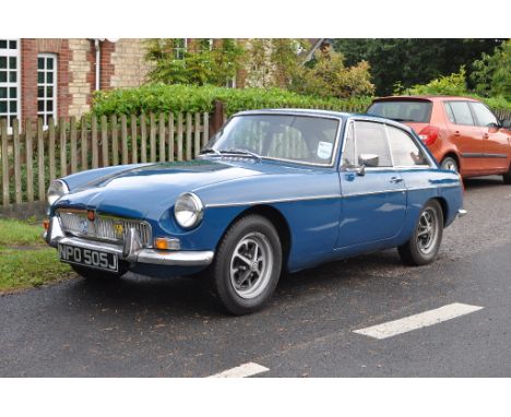 A 1971 MG B GT, registration number NPO 505J, teal blue. This B GT is a desirable manual overdrive example and sits on Rostyl