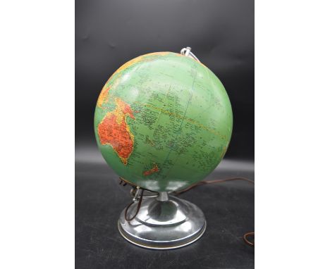 A vintage light up globe on chrome base. H.40 Dia.20cm (base) 