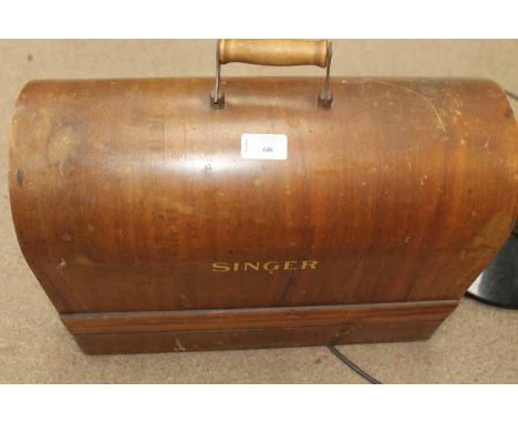 SINGER SEWING MACHINE 
together with  a retro floor lamp (2)