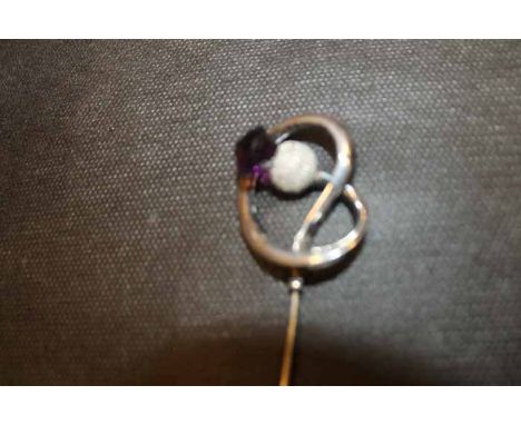 CHARLES HORNER SILVER AMETHYST SET HAT PIN
maker Charles Horner, Chester, end in the form of a knot with a thiste finial set 