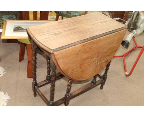 OAK GATELEG TABLE
with two drop leafs and with barley twist legs, 105cm long when extended 