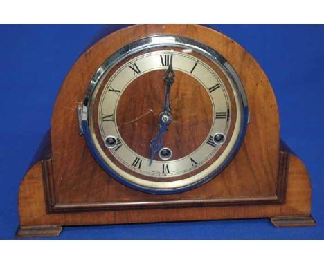 EARLY 20TH CENTURY MANTEL CLOCK
the arched case with bracket feet, Roman numerals