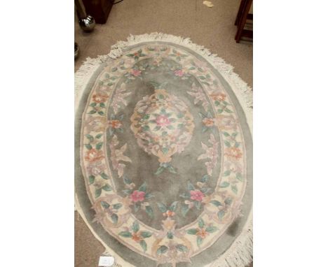 TWO CHINESE-STYLE CARPETS
larger with a yellow ground and floral design in predominately pink, green and orange, the smaller 