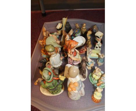 LOT OF CERAMIC FIGURES
including a Lladro figure of a girl, three Goebel figures, Pendelfin rabbit figures, Wade and Wade-sty