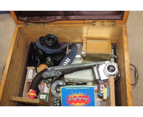 LOT OF COLLECTABLES
including cameras, replica pistol, carriage clock, plated cutlery, contained within a large oak casket