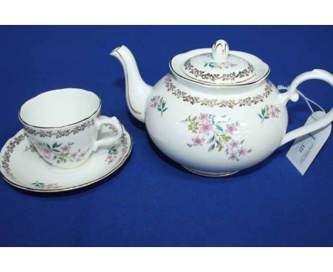 ROYAL GRAFTON TEA SERVICE
with floral decoration in pink and gilt, comprising teapot, sugar and cream, six saucers, six side 