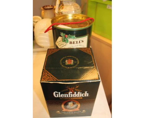 BELLS CHRISTMAS DECANTER 1989
together with a Glenfiddich Heritage Reserve, both boxed (2)