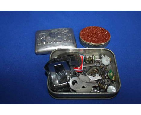 INDIAN METAL CIGARETTE CASE
along with a white metal snuff box, buckles, keys, etc