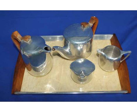 PICQUOT WARE FOUR PIECE TEA SERVICE WITH TRAY
comprising teapot, hot water pot, cream jug and suagr bowl, of typical Picquot 