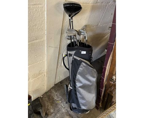 Golf caddy and clubs