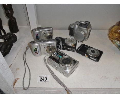 6 digital cameras including Samsung, Vivitar, Lumix, Polaroid and Finepix.