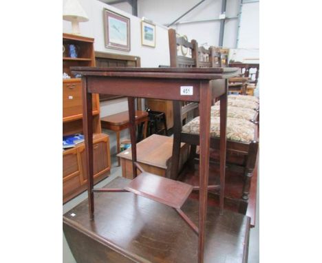 An Edwardian mahogany inlaid card table.
