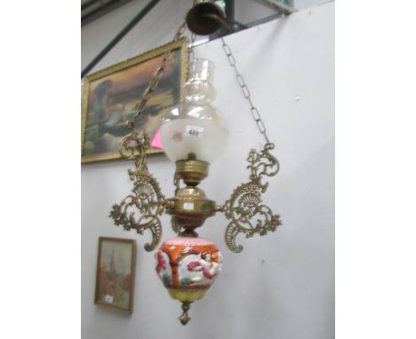 A ceramic and brass ceiling light, a/f.