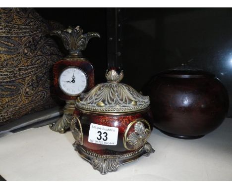 An ornament quartz movement clock with matching trinket pot and another trinket pot 