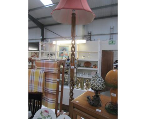 A standard lamp with shade.