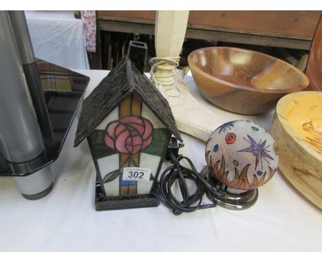 A Tiffany style table lamp and one other,.