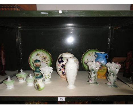 A shelf of assorted ceramic ware consisting of vases, plates, trinket pots etc. including Wedgewood, Masons etc. 