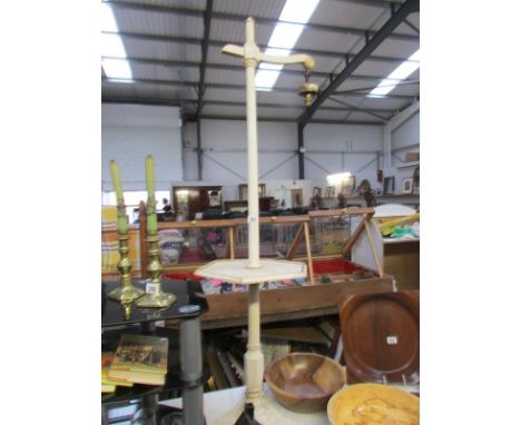 A shabby chic floor lamp.