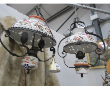 A pair of ceramic ceiling lights.